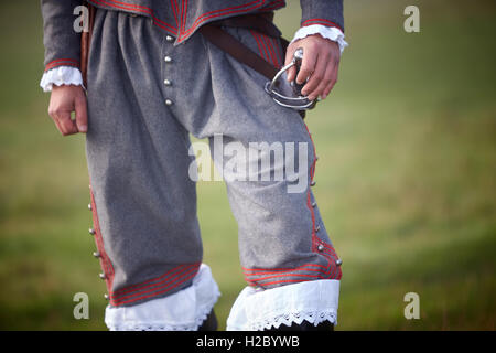 A member of the English Civil War Society dressed as a royalist officer for a re-enactment of the siege of Wallingford Castle Stock Photo