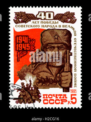 Postage stamp from the Soviet Union depicting a soldier and armed forces (end of World War 2, victory over fascism, 40th ann.) Stock Photo