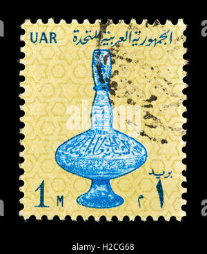 Postage stamp from the United Arab Republic (Egypt) depicting a 14th century vase. Stock Photo