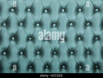 Silver blue teal capitone textile background, retro Chesterfield style checkered soft tufted fabric furniture diamond pattern de Stock Photo