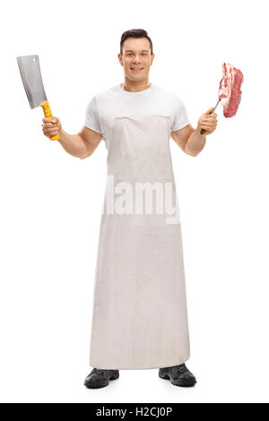 Full length portrait of a butcher holding a cleaver and a fork with a steak isolated on white background Stock Photo