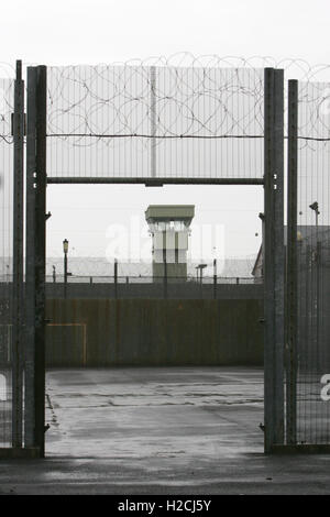 A watchtower and perimeter wall marks the boundary of the former Maze Prison, west of Belfast in Northern Ireland, U.K.  Prison, Stock Photo