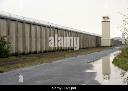 A watchtower and perimeter wall marks the boundary of the former Maze Prison, west of Belfast in Northern Ireland, U.K.  Prison, Stock Photo