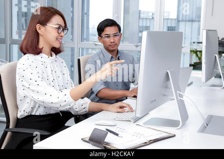 Business people having a discussion in office Stock Photo
