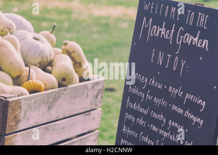 Welcome to the market garden sign chalked on a sign at Daylesford autumn show. England Stock Photo