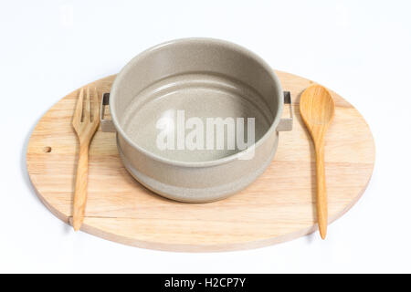 empty tiffin with wooden spoon fork on wood isolated on with background Stock Photo