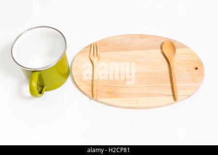 empty tiffin with wooden spoon fork on wood isolated on with background Stock Photo