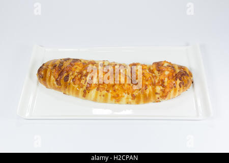cheese bread stick on ceramic plate Stock Photo