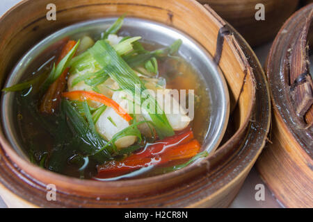 Chinese Dim Sum in bamboo steamer Stock Photo