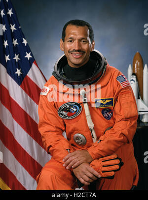 Official portrait of NASA astronaut Charles Bolden Jr. wearing an orange launch and entry space suit October 17, 1991. Bolden is the current NASA administrator and was the first African-American to head the agency on a permanent basis. Stock Photo