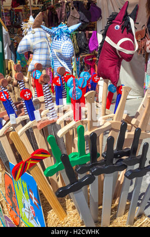 Medieval wooden toys for sale at street market Stock Photo