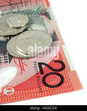 australian twenty dollars note and coins on white Stock Photo