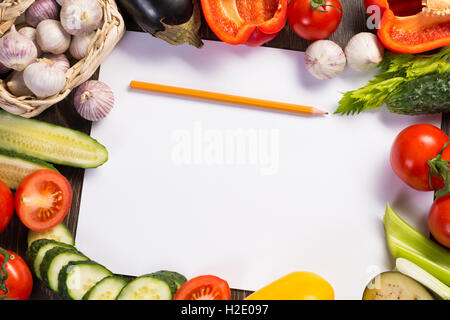 Vegetables tiled around a sheet of paper Stock Photo