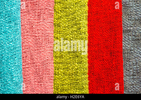 Row of colourful woven fabrics for sale, Sang Ha, Louangphabang, Laos Stock Photo