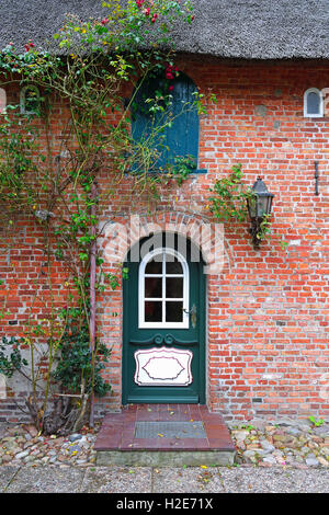 Typical entrance, old Frisian house, thatched roof, Keitum, Sylt, North Frisian Islands, North Frisia, Schleswig-Holstein Stock Photo