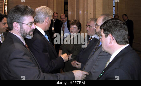 FILE YEAR 2000 - TAKEN INSIDE STORMONT - Sinn Fein's Gerry Adams (L) joins the then US  President Bill Clinton, Sinn Fein's Pat Doherty and Sinn Fein's Martin McGuinness inside Stormont Parliament Buildings, Belfast, Northern Ireland. the late PUP leader David Ervine can be seen looking at Bill Clinton. Stock Photo