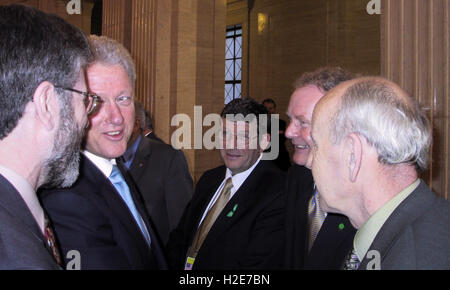 FILE YEAR 2000 - TAKEN INSIDE STORMONT - Sinn Fein's Gerry Adams (L) joins the then US  President Bill Clinton, Sinn Fein's Pat Doherty and Sinn Fein's Martin McGuinness inside Stormont Parliament Buildings, Belfast, Northern Ireland. Stock Photo