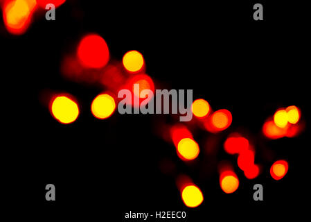 Abstract defocused orange bokeh light background Stock Photo