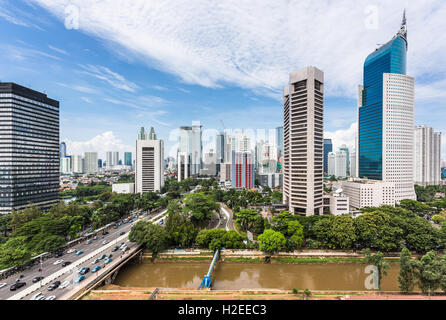 Jakarta skyline with modern office towers and hotels along Jalan Sudirman in Indonesia capital city business district. Stock Photo