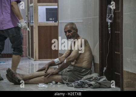 September 25, 2016 - Aleppo, Syria - Syrian jets have attacked the besieged town of Aleppo with cluster bombs, causing several deaths and injures and much burning. (Credit Image: © Basem Ayoubi/ImagesLive via ZUMA Wire) Stock Photo