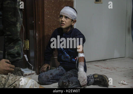 September 25, 2016 - Aleppo, Syria - Syrian jets have attacked the besieged town of Aleppo with cluster bombs, causing several deaths and injures and much burning. (Credit Image: © Basem Ayoubi/ImagesLive via ZUMA Wire) Stock Photo