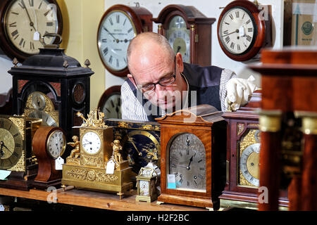 Witney, Oxfordshire, UK. 27th October, 2016. Clock repairer Steve Fletcher from Witney, Oxfordshire is getting ready for the clocks going back this Sunday. Images released 28th October, 2016. He's the third generation of his family who has been responsible for changing the clock at St Mary's Church in the town.     Credit:  Ric Mellis/Alamy Live News Stock Photo