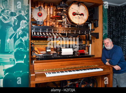 Thomas Jansen presenting a self-playing musical instrument of the type 'Hupfeld-Sinfonie-Jazz-Orchester' from 1920 in his Music Museum in Beeskow, Germany, 24 October 2016. PHOTO: PATRICK PLEUL/dpa Stock Photo