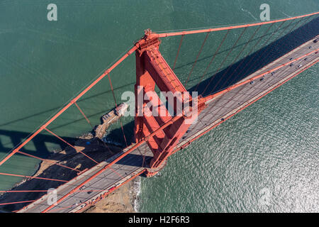 Aerial view of Golden Gate Bridge suspension tower, cable and road above San Francisco Bay in California. Stock Photo