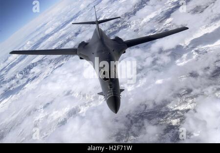 U.S. Air Force B-1B Lancer stealth bomber aircraft flies over snow-covered mountains September 25, 2006 in the Nevada and Utah region. Stock Photo