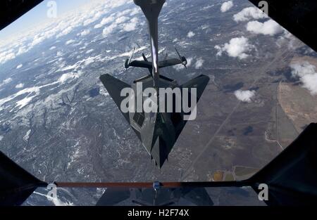 A U.S. Air Force F-117A Nighthawk aircraft refuels while in flight February 2, 2005 over New Mexico. Stock Photo