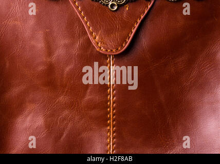 closeup of the fittings on the brown leather hand bag Stock Photo