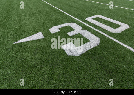 Numbers on a football field. 30. Stock Photo