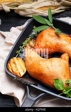 Smoked chicken legs with grilled vegetables top view Stock Photo