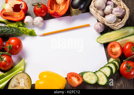 Vegetables tiled around a sheet of paper Stock Photo