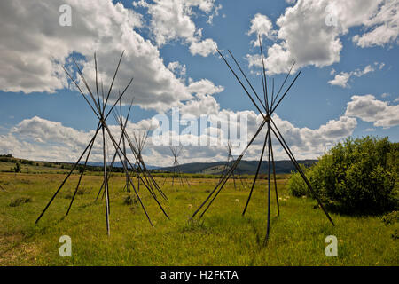 MONTANA - Ghost tepees, poles standing to mark the location of where the Nez Perce were sleeping the night of the slaughter. Stock Photo