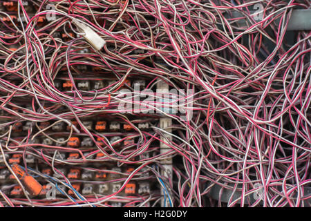 Switchboard panel with messy cables connections,The PABX. Stock Photo