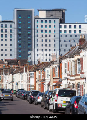 New student accommodation 'Crescent Place' run by The Student Housing Company towering over terrace housing in Southampton, UK Stock Photo