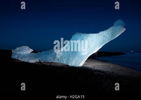 Icebergs of glacial ice on black sands, Breidamerkurfjara beach, Iceland. Located in Eastern Iceland by the Jokulsarlon. Stock Photo