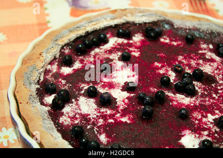 pie with bilberry on the big round plate Stock Photo