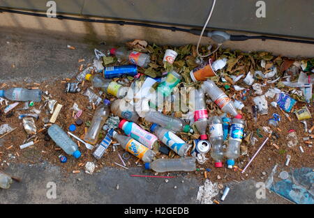 AJAXNETPHOTO. PARIS, FRANCE. - STREET POLLUTION - DISCARDED PLASTIC BOTTLES AND OTHER RUBBISH AWAITING CLEARANCE ON A CITY STREET.  PHOTO:JONATHAN EASTLAND/AJAX  REF:D60606 1312 Stock Photo