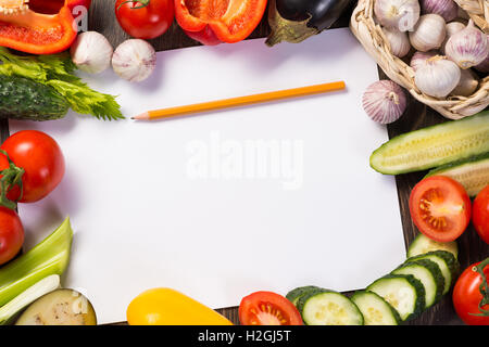 Vegetables tiled around a sheet of paper Stock Photo