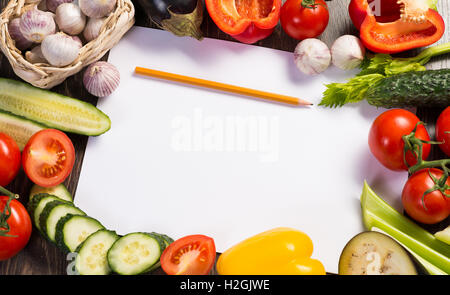 Vegetables tiled around a sheet of paper Stock Photo