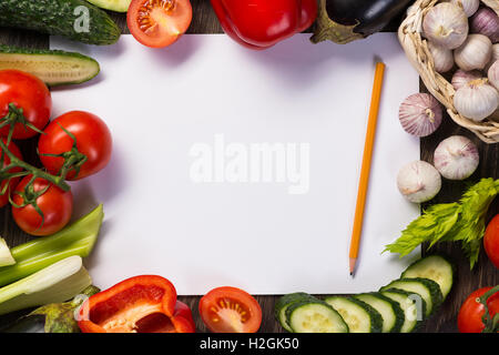 Vegetables tiled around a sheet of paper Stock Photo