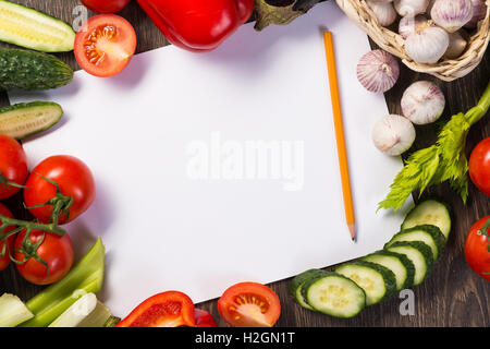 Vegetables tiled around a sheet of paper Stock Photo