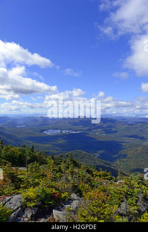 Alpine view from summit of a 46er with vast forests clouds and wilderness in the Adirondack Mountains, New York State Stock Photo