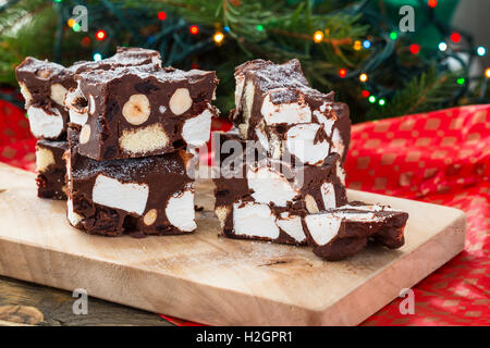 Rocky road crunch bars, christmas dessert made with chocolate,  marshmallow, hazelnut, biscuit and glace cherries Stock Photo