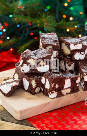 Rocky road crunch bars, christmas dessert made with chocolate,  marshmallow, hazelnut, biscuit and glace cherries Stock Photo