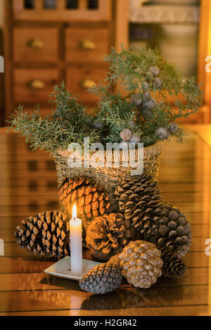 Christmas decoration with pineapple and juniper branches Stock Photo