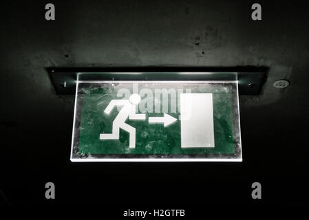 Illuminated emergency exit sign, Berlin, Germany Stock Photo