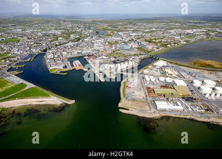 View of town and harbour, docks and Business Enterprise Park, Galway, County Clare, Ireland Stock Photo